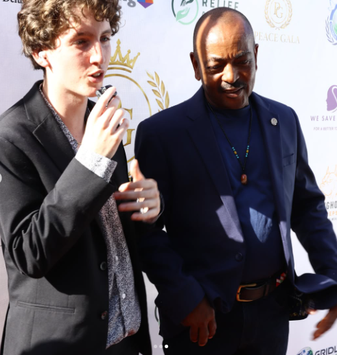 Aiden speaking, mid-gala